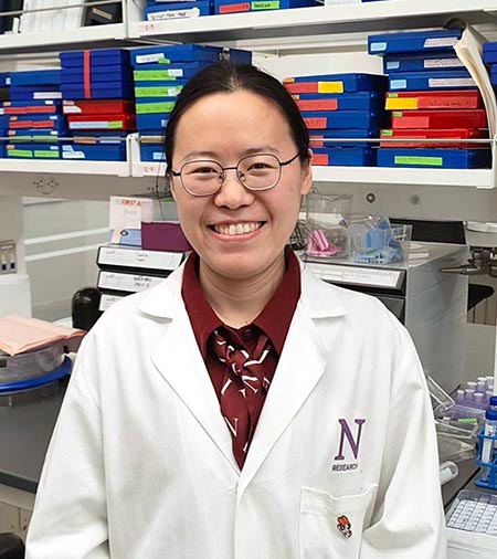 Fang Tang in a research laboratory