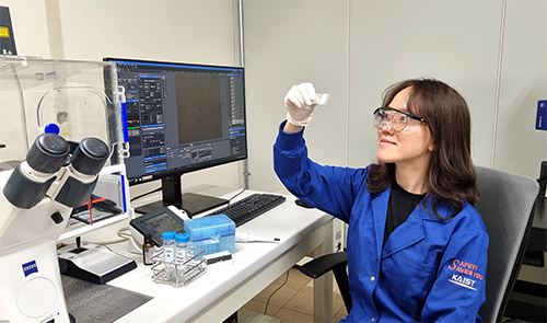 Nayoung Kim analyzing a material in a research lab.