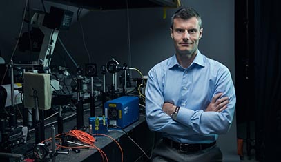 Vadim Backman standing in a research laboratory